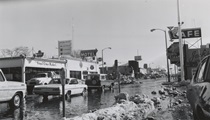 A black and white image from the 1960s of downtown Bishop with snow and flood waters.