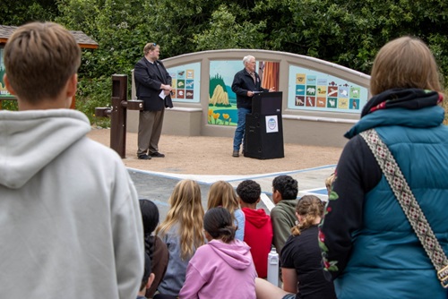 Tom Fitzgerald speaks as Rio Dell City Manager and students from Eagle Prairie Elementary school look on